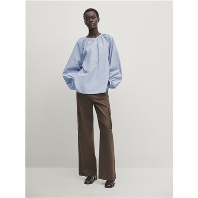 Blusa efecto arrugado
