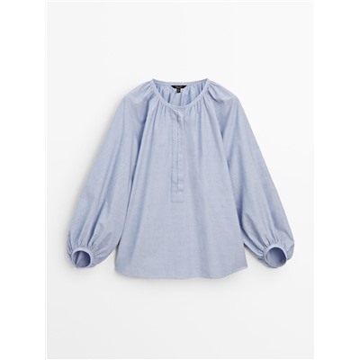 Blusa efecto arrugado