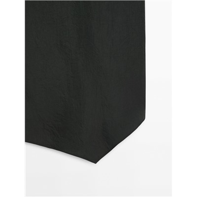 Vestido midi detalle cuello lazada