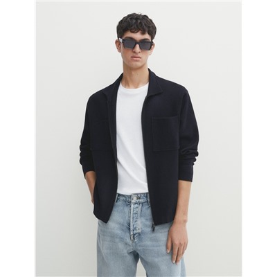 Cárdigan punto cremallera cuello camisero