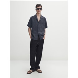 Camisa lino manga corta bolsillos