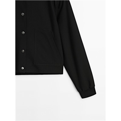 Chaqueta bomber corta botones snaps