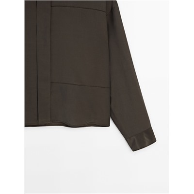 Camisa con seda detalle costura