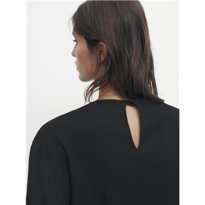 Blusa manga larga detalle hombro drapeado