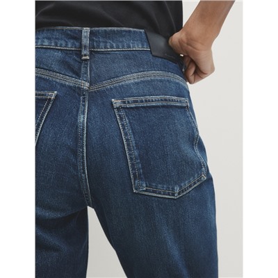 Jeans tiro alto bootcut