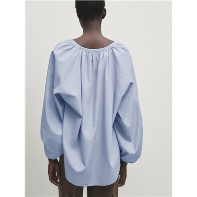 Blusa efecto arrugado