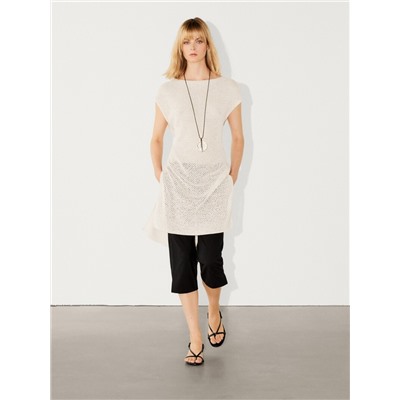 Knit vest with vent details