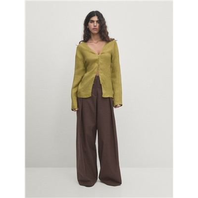 100% linen oversize blouse with low-cut back