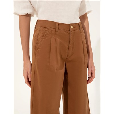 Перевернутые брюки Taba Flare