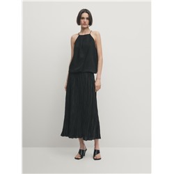 Falda midi negra plisada