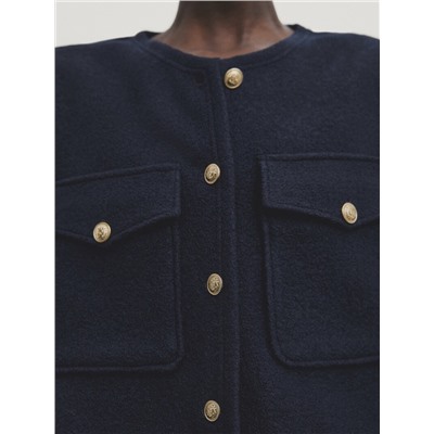 Chaqueta corta 100% lana bolsillos