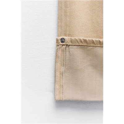 JEANS TRF COLOR BAJO VUELTA TIRO ALTO