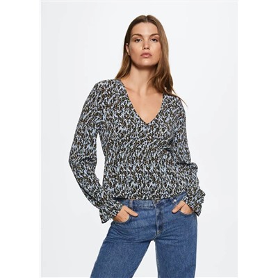 Blusa fluida textura -  Mujer | MANGO OUTLET España