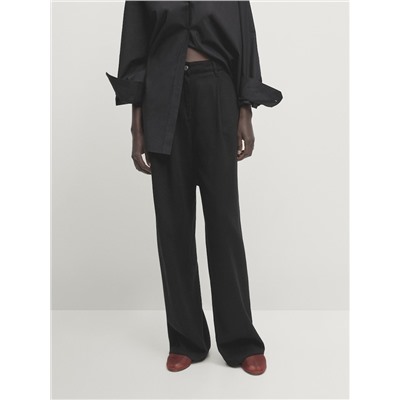 Pantalón fluido lyocell pinzas