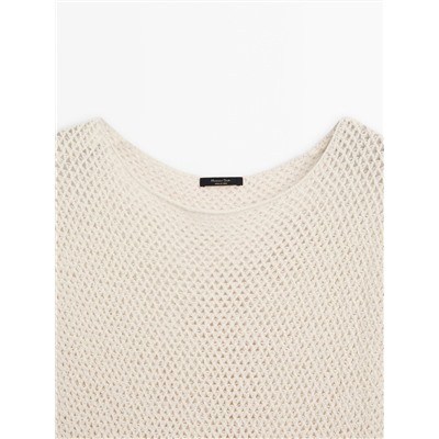 Knit vest with vent details