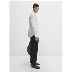 Pantalón detalle bolsillo relaxed fit