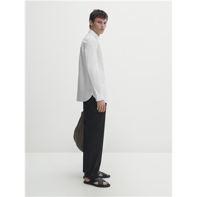Pantalón detalle bolsillo relaxed fit
