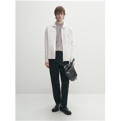 Cárdigan punto cremallera cuello camisero