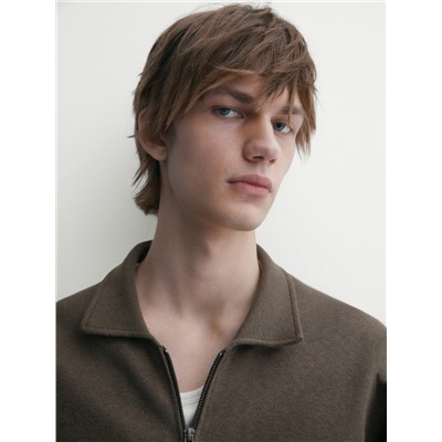 Cárdigan punto cremallera cuello camisero