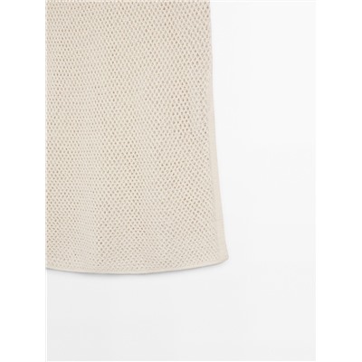 Knit vest with vent details