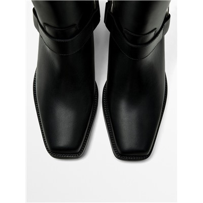 Bota estribo lateral