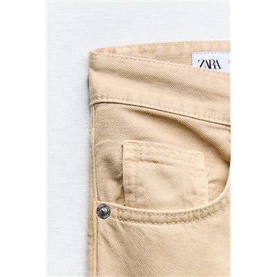 JEANS TRF COLOR BAJO VUELTA TIRO ALTO