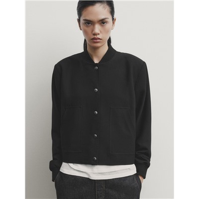 Chaqueta bomber corta botones snaps