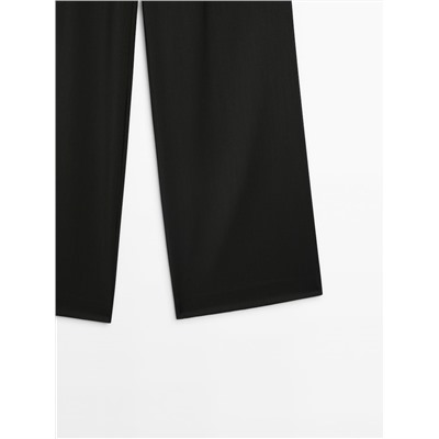 Pantalón traje ancho pinzas