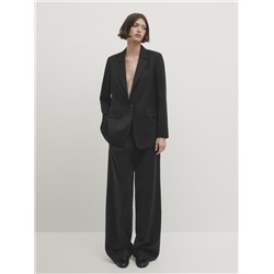 Americana larga traje un botón