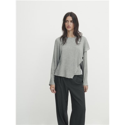 Blusa con algodón detalle volante