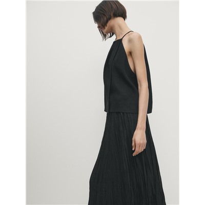 Falda midi negra plisada