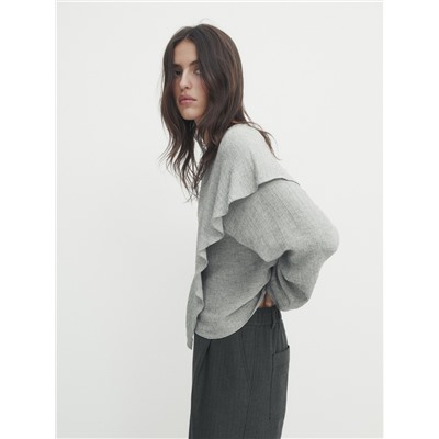 Blusa con algodón detalle volante