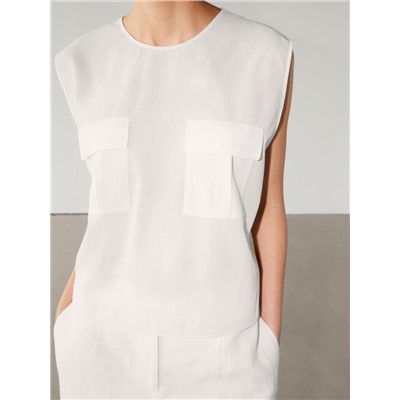 Top fluido algodón bolsillos