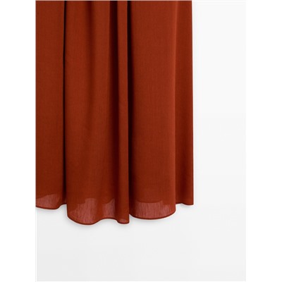 Vestido midi tirantes detalle tablas