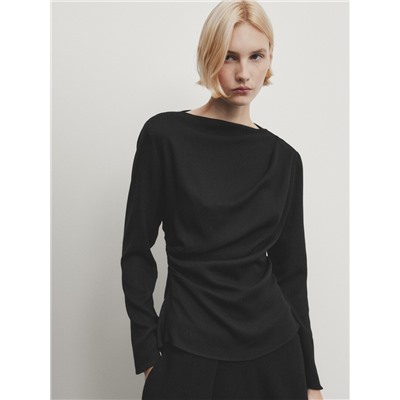 Blusa manga larga detalle drapeado
