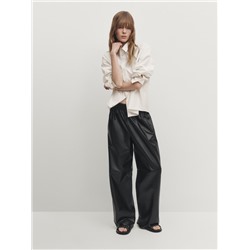 Camisa cropped detalle botones