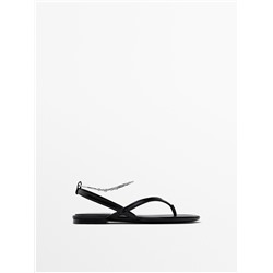 Flat sandals with ankle strap