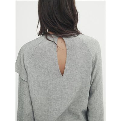 Blusa con algodón detalle volante