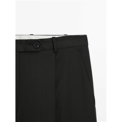 Pantalón traje ancho pinzas