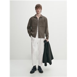 Cárdigan punto cremallera cuello camisero