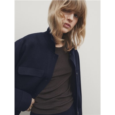 Chaqueta punto milano bolsillos
