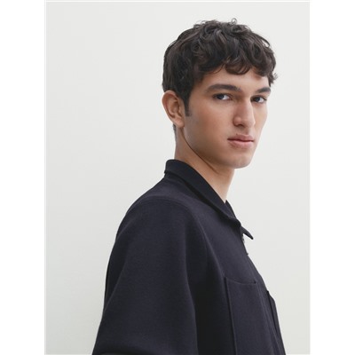 Cárdigan punto cremallera cuello camisero